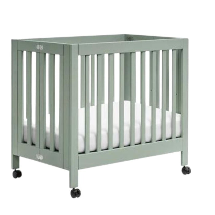 Origami Portable Mini Crib by Babyletto at $479! Shop now at Nestled by Snuggle Bugz for Cribs.