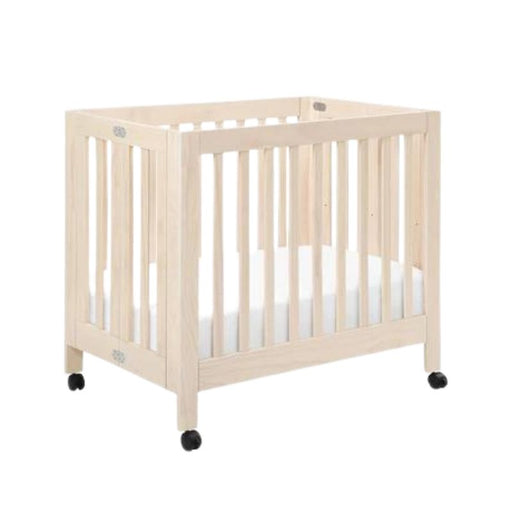 Origami Portable Mini Crib by Babyletto at $479! Shop now at Nestled by Snuggle Bugz for Cribs.