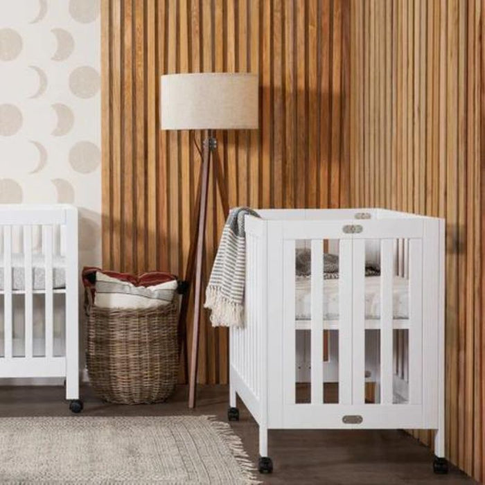 Origami Portable Mini Crib by Babyletto at $479! Shop now at Nestled by Snuggle Bugz for Cribs.
