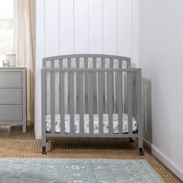 Dylan Folding Portable 3-in-1 Mini Crib by DaVinci at $239! Shop now at Nestled by Snuggle Bugz for Cribs.