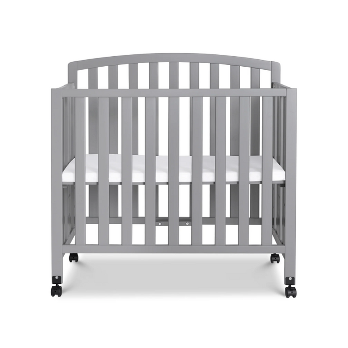 Dylan Folding Portable 3-in-1 Mini Crib by DaVinci at $239! Shop now at Nestled by Snuggle Bugz for Cribs.