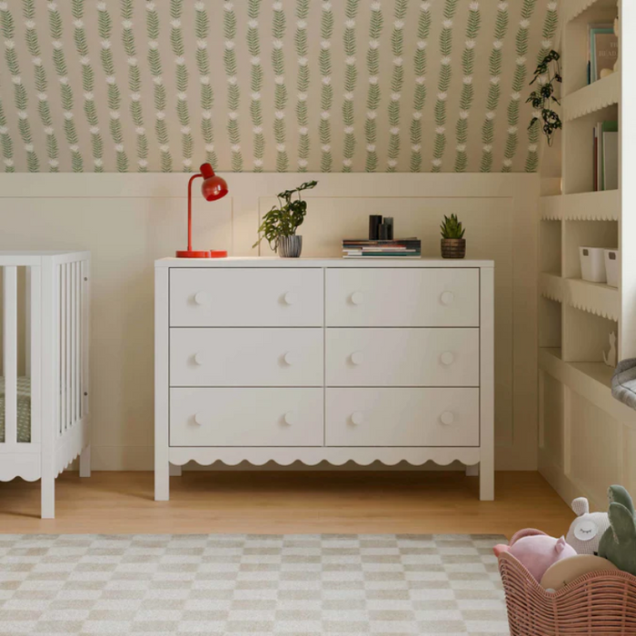 Sammy Scallop 6-Drawer Dresser by DaVinci at $549! Shop now at Nestled by Snuggle Bugz for Nursery & Décor.