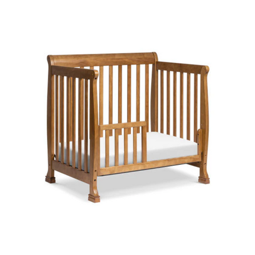 Kalani Mini Crib by DaVinci Baby at $229! Shop now at Nestled by Snuggle Bugz for Cribs.