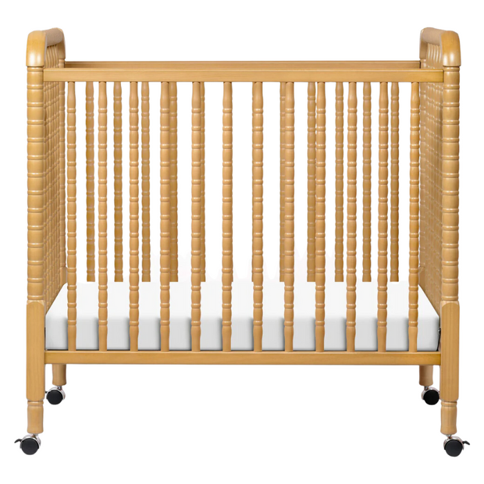 Jenny Lind Mini Crib by DaVinci Baby at $299! Shop now at Nestled by Snuggle Bugz for Cribs.