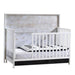 Vibe 5-in-1 Convertible Crib by Nest by Natart at $959! Shop now at Nestled by Snuggle Bugz for Cribs.