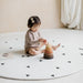 Ofie Reversible Baby Play Mat - Round by Little Bot at $169.99! Shop now at Nestled by Snuggle Bugz for Nursery & Decor.