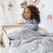 Weighted Toddler Blanket by Aden & Anais at $129.99! Shop now at Nestled by Snuggle Bugz for Nursery & Décor.