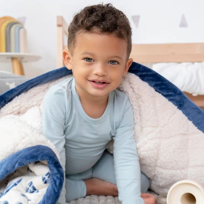 Weighted Toddler Blanket by Aden & Anais at $129.99! Shop now at Nestled by Snuggle Bugz for Nursery & Décor.