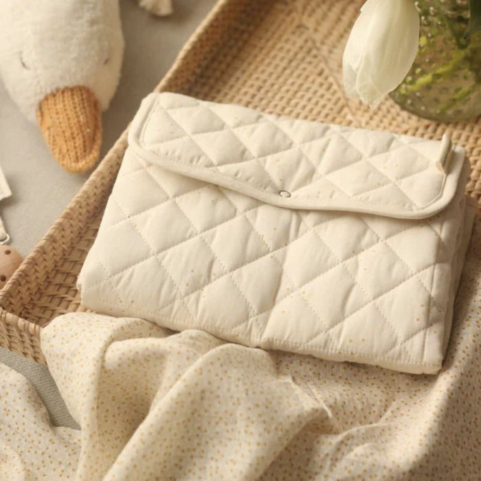 Organic Baby Travel Changing Mat by Avery Row at $49.99! Shop now at Nestled by Snuggle Bugz for Nursery & Décor.