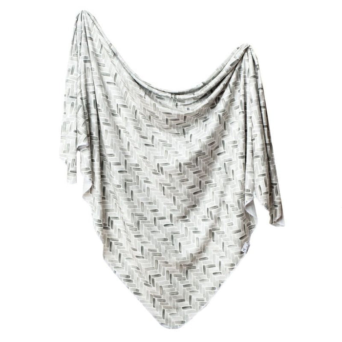 Knit Swaddle Blanket by Copper Pearl at $31.88! Shop now at Nestled by Snuggle Bugz for Nursery & Decor.