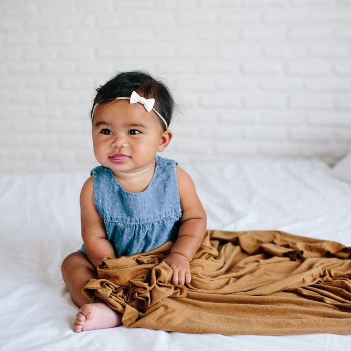 Knit Swaddle Blanket by Copper Pearl at $31.88! Shop now at Nestled by Snuggle Bugz for Nursery & Decor.