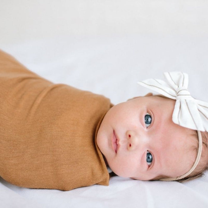 Knit Swaddle Blanket by Copper Pearl at $31.88! Shop now at Nestled by Snuggle Bugz for Nursery & Decor.