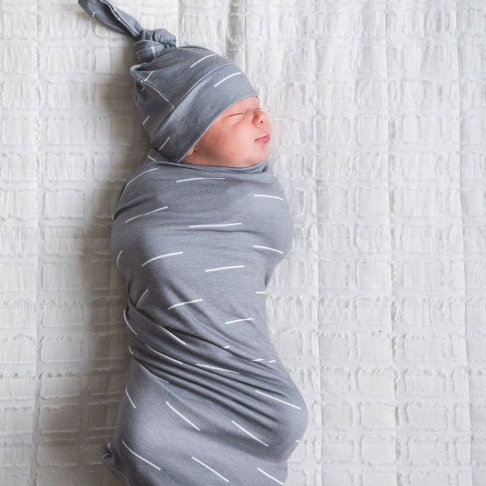 Knit Swaddle Blanket by Copper Pearl at $31.88! Shop now at Nestled by Snuggle Bugz for Nursery & Decor.