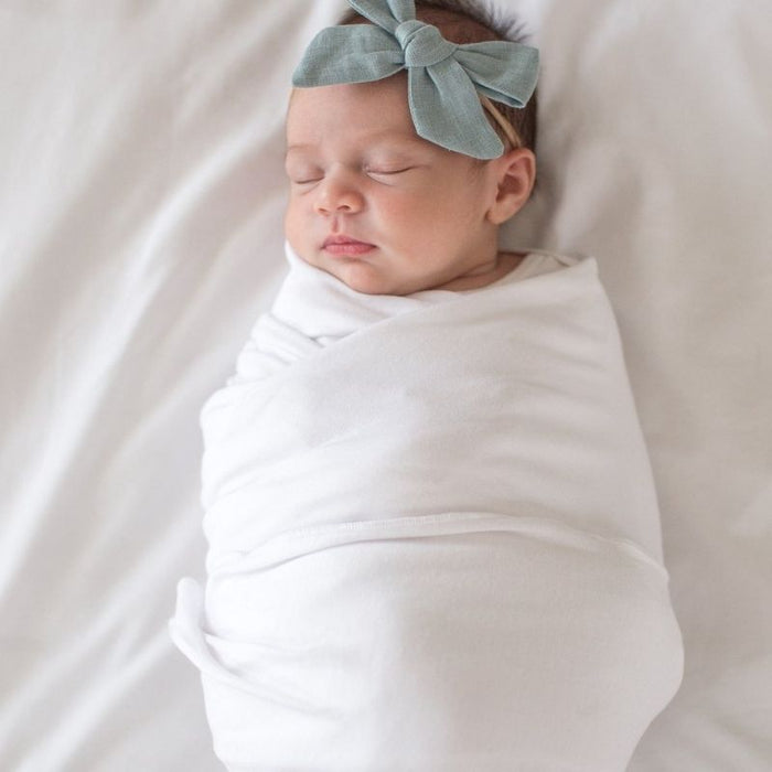 Knit Swaddle Blanket by Copper Pearl at $31.88! Shop now at Nestled by Snuggle Bugz for Nursery & Decor.