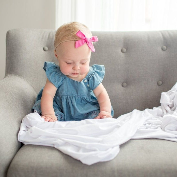 Knit Swaddle Blanket by Copper Pearl at $31.88! Shop now at Nestled by Snuggle Bugz for Nursery & Decor.