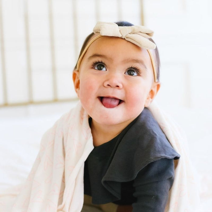 Knit Swaddle Blanket by Copper Pearl at $31.88! Shop now at Nestled by Snuggle Bugz for Nursery & Decor.