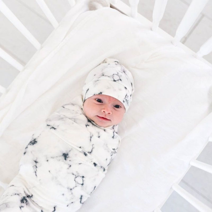 Knit Swaddle Blanket by Copper Pearl at $31.88! Shop now at Nestled by Snuggle Bugz for Nursery & Decor.