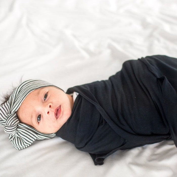 Knit Swaddle Blanket by Copper Pearl at $31.88! Shop now at Nestled by Snuggle Bugz for Nursery & Decor.