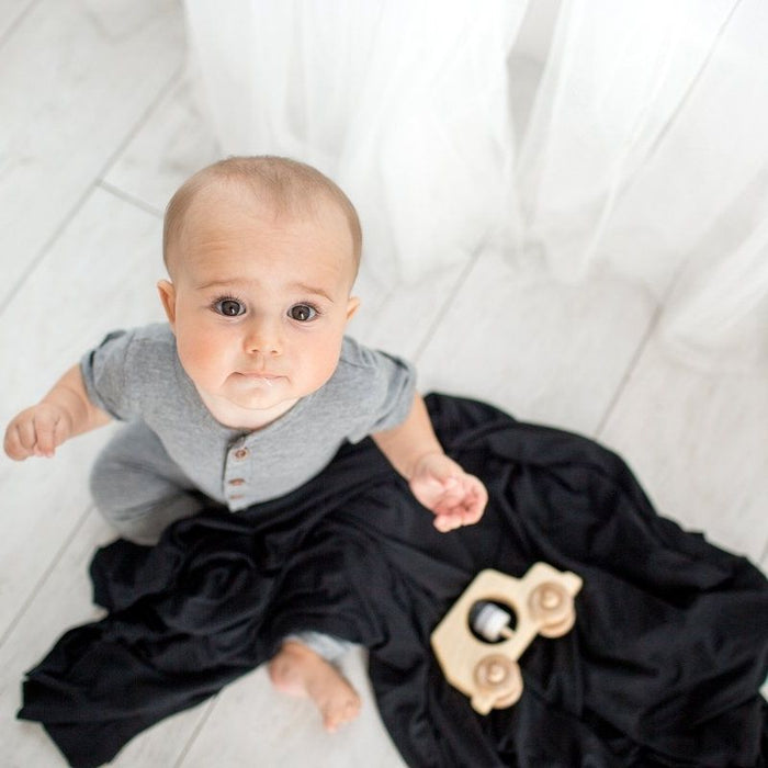 Knit Swaddle Blanket by Copper Pearl at $31.88! Shop now at Nestled by Snuggle Bugz for Nursery & Decor.