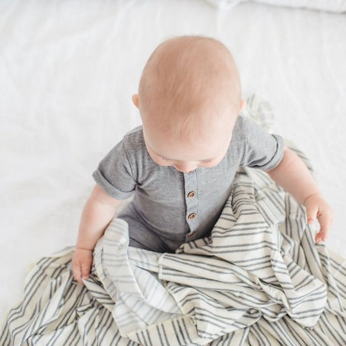 Knit Swaddle Blanket by Copper Pearl at $31.88! Shop now at Nestled by Snuggle Bugz for Nursery & Decor.