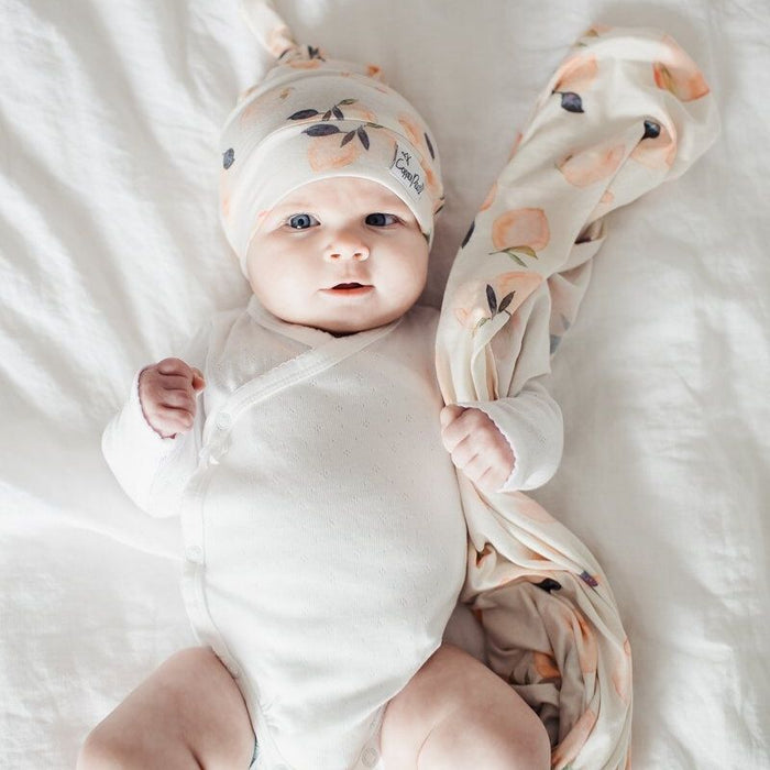 Knit Swaddle Blanket by Copper Pearl at $31.88! Shop now at Nestled by Snuggle Bugz for Nursery & Decor.