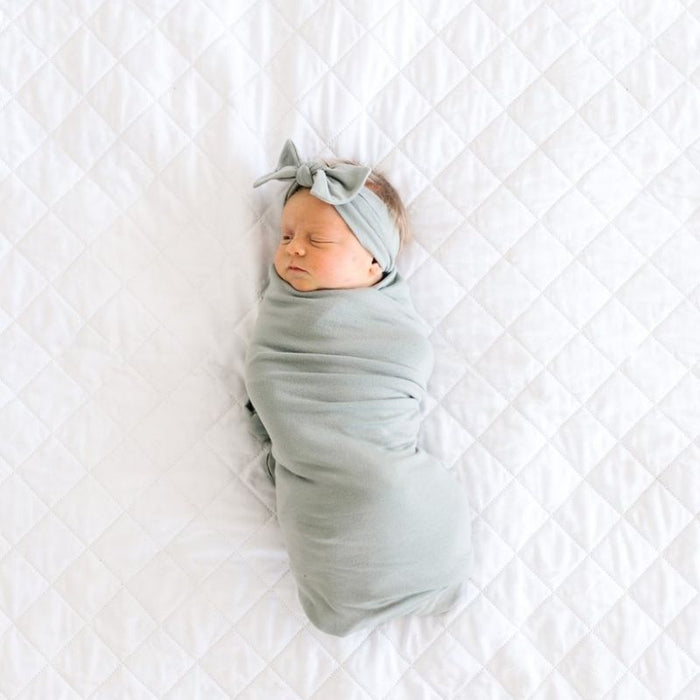 Knit Swaddle Blanket by Copper Pearl at $31.88! Shop now at Nestled by Snuggle Bugz for Nursery & Decor.