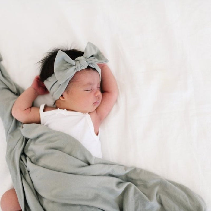 Knit Swaddle Blanket by Copper Pearl at $31.88! Shop now at Nestled by Snuggle Bugz for Nursery & Decor.