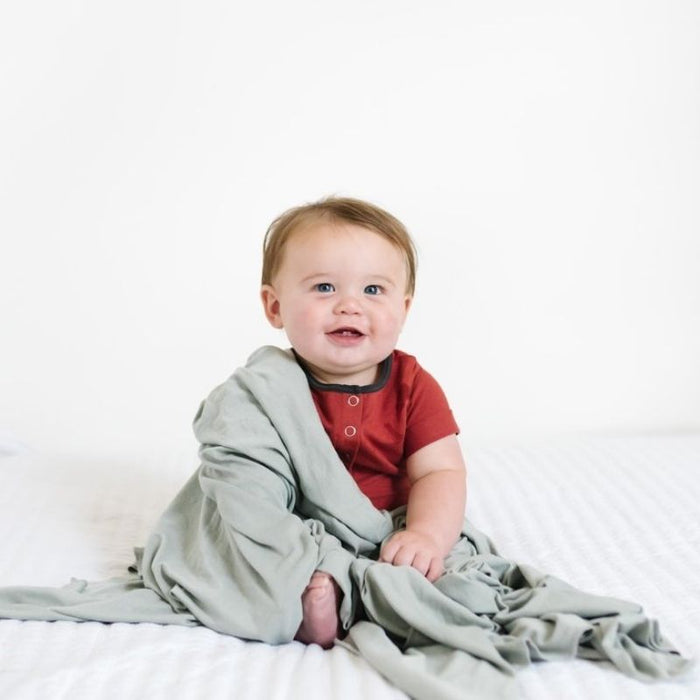 Knit Swaddle Blanket by Copper Pearl at $31.88! Shop now at Nestled by Snuggle Bugz for Nursery & Decor.