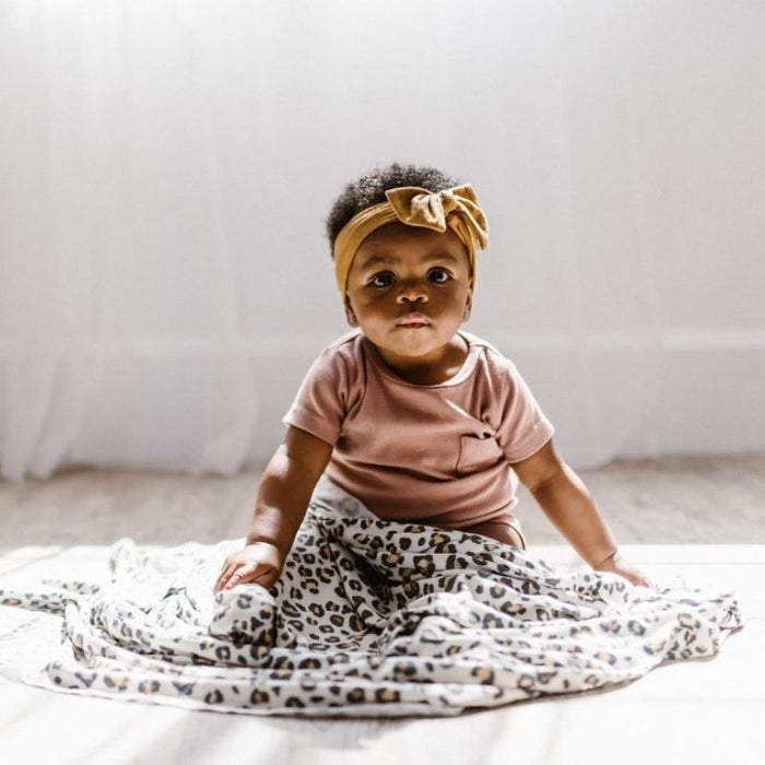 Knit Swaddle Blanket by Copper Pearl at $31.88! Shop now at Nestled by Snuggle Bugz for Nursery & Decor.