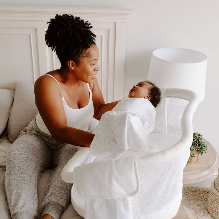 BassiNest Swivel Sleeper- Premiere - Pebble by HALO at $349.99! Shop now at Nestled by Snuggle Bugz for Nursery & Décor.