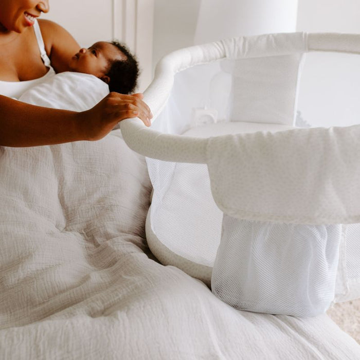 BassiNest Swivel Sleeper- Premiere - Pebble by HALO at $349.99! Shop now at Nestled by Snuggle Bugz for Nursery & Décor.