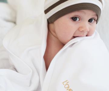 Organic Swaddling Blanket by L'ovedbaby at $23.99! Shop now at Nestled by Snuggle Bugz for Nursery & Decor.