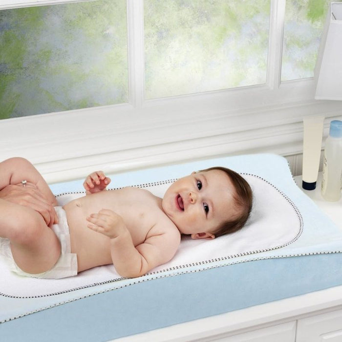 Change Pad Cover With Liner by Munchkin at $17.88! Shop now at Nestled by Snuggle Bugz for Nursery & Décor.