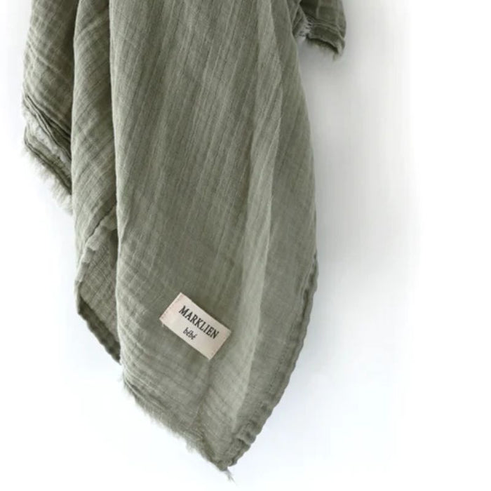 Organic 2 Layer Muslin Swaddle by MARKLIEN at $24.99! Shop now at Nestled by Snuggle Bugz for Nursery & Décor.