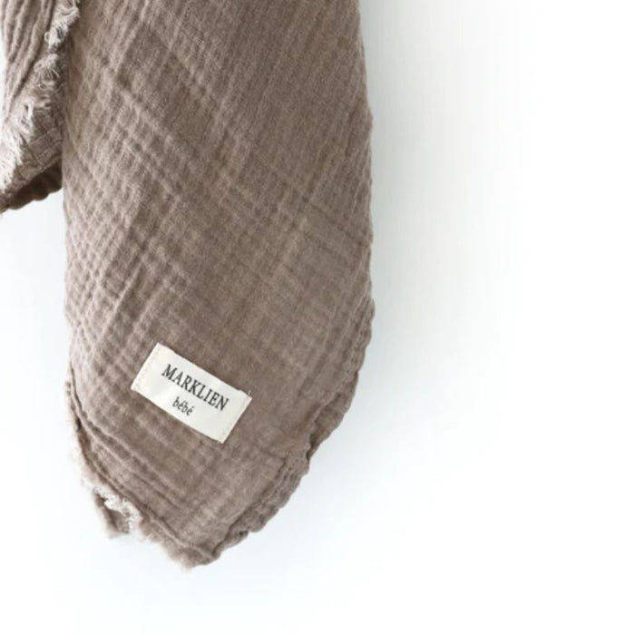 Organic 2 Layer Muslin Swaddle by MARKLIEN at $24.99! Shop now at Nestled by Snuggle Bugz for Nursery & Décor.