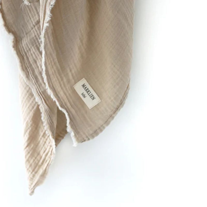 Organic 2 Layer Muslin Swaddle by MARKLIEN at $24.99! Shop now at Nestled by Snuggle Bugz for Nursery & Décor.