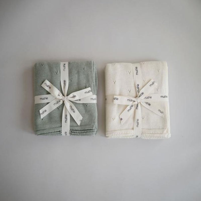 Knitted Pointelle Baby Blanket by Mushie at $60.99! Shop now at Nestled by Snuggle Bugz for Nursery & Décor.