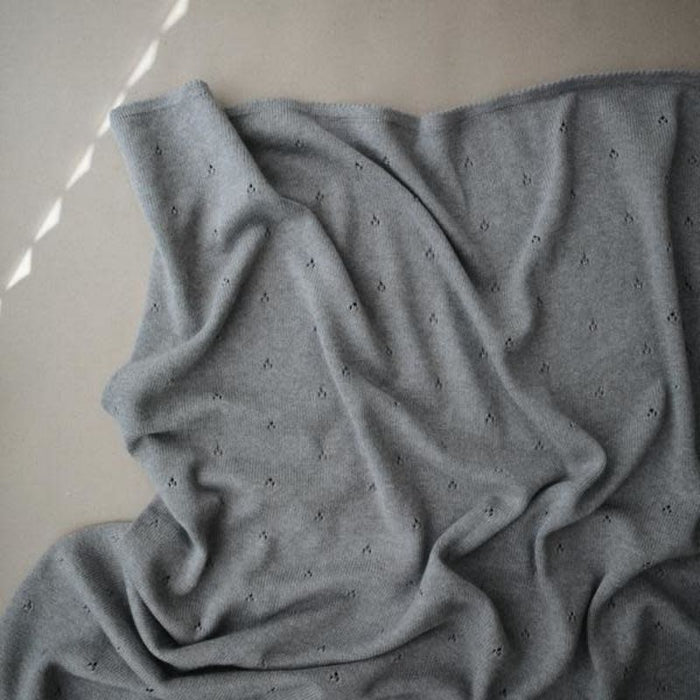 Knitted Pointelle Baby Blanket by Mushie at $60.99! Shop now at Nestled by Snuggle Bugz for Nursery & Décor.