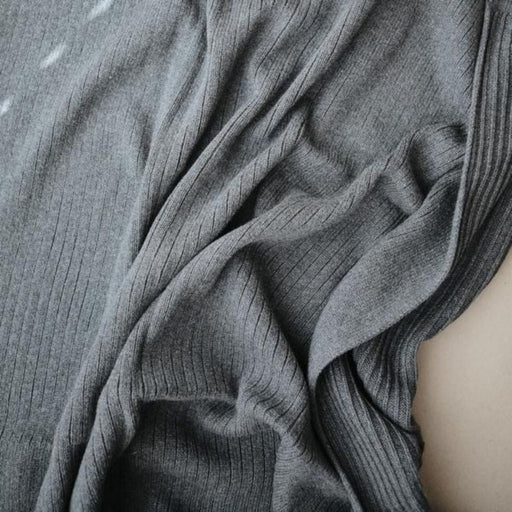 Knitted Ribbed Baby Blanket by Mushie at $60.99! Shop now at Nestled by Snuggle Bugz for Nursery & Décor.