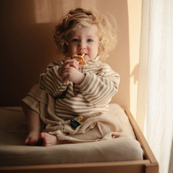 Extra Soft Muslin Changing Pad Cover by Mushie at $32.99! Shop now at Nestled by Snuggle Bugz for Nursery & Décor.