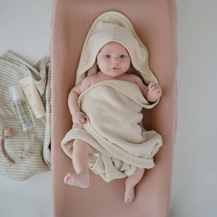 Extra Soft Muslin Changing Pad Cover by Mushie at $32.99! Shop now at Nestled by Snuggle Bugz for Nursery & Décor.