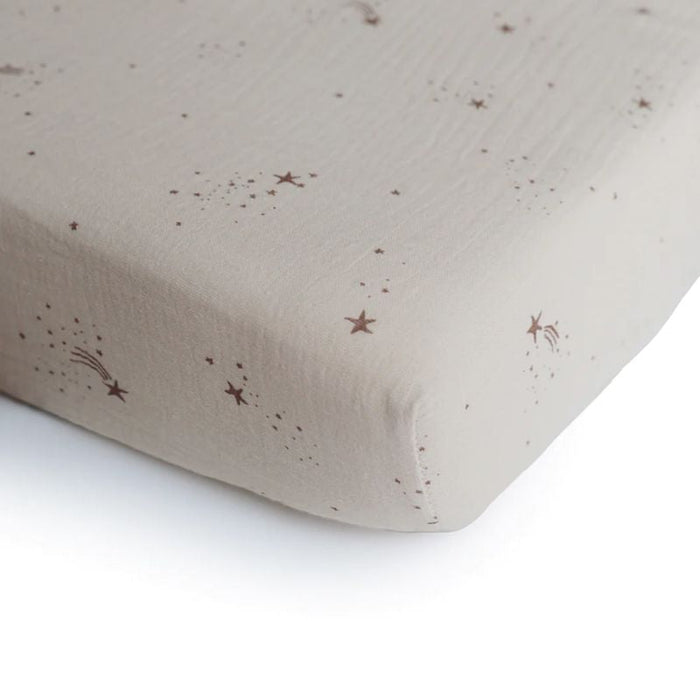 Extra Soft Muslin Crib Sheet by Mushie at $33.99! Shop now at Nestled by Snuggle Bugz for Nursery & Décor.
