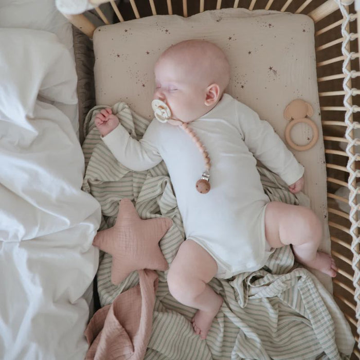 Extra Soft Muslin Crib Sheet by Mushie at $33.99! Shop now at Nestled by Snuggle Bugz for Nursery & Décor.