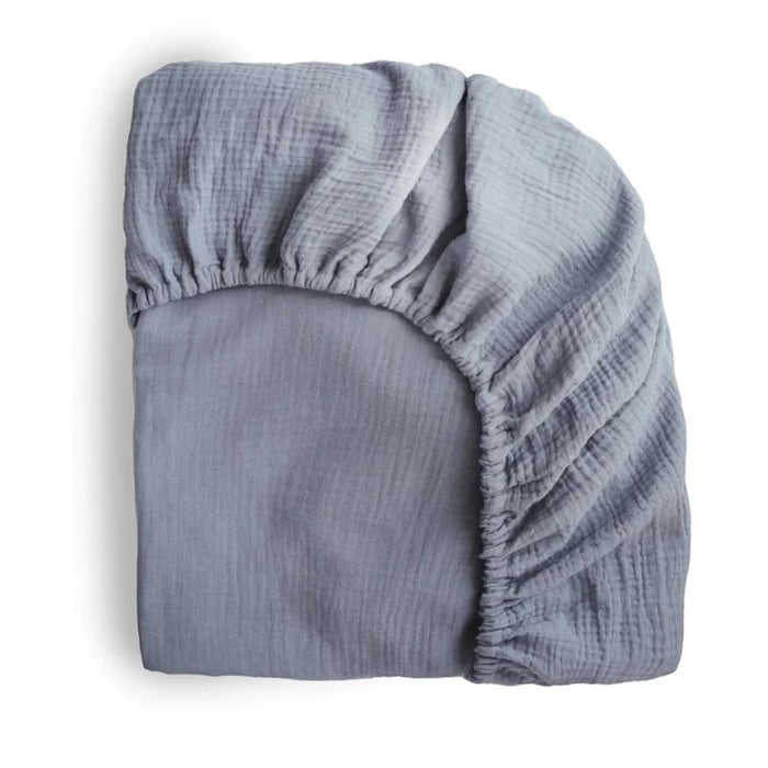 Extra Soft Muslin Crib Sheet by Mushie at $33.99! Shop now at Nestled by Snuggle Bugz for Nursery & Décor.