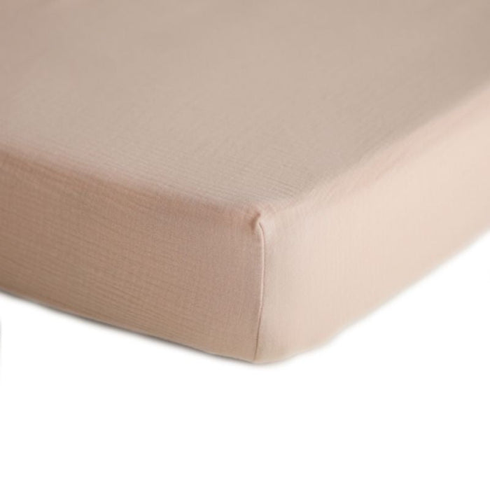 Extra Soft Muslin Crib Sheet by Mushie at $33.99! Shop now at Nestled by Snuggle Bugz for Nursery & Décor.