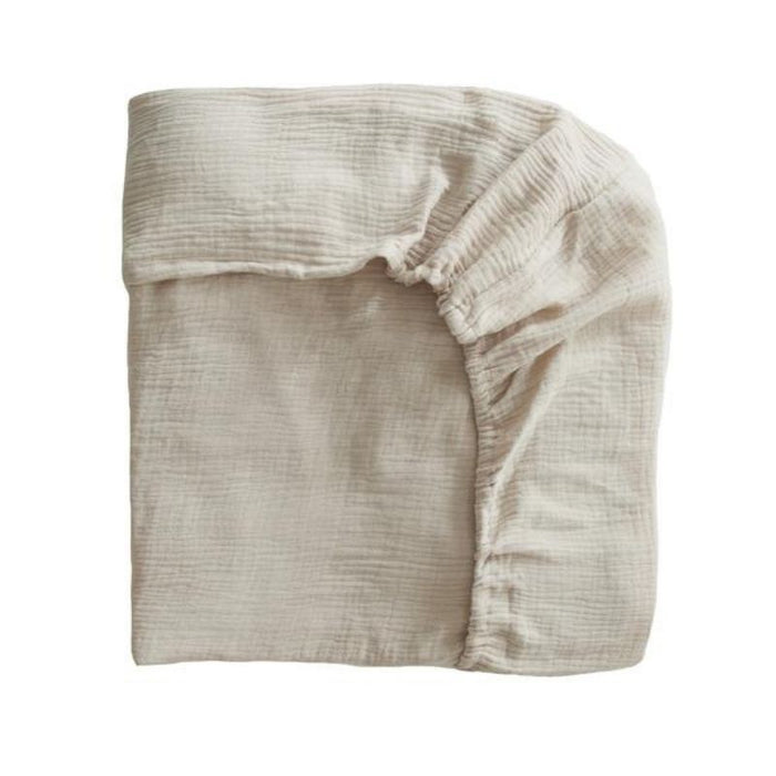 Extra Soft Muslin Crib Sheet by Mushie at $33.99! Shop now at Nestled by Snuggle Bugz for Nursery & Décor.