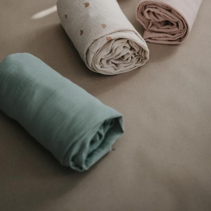 Extra Soft Muslin Crib Sheet by Mushie at $33.99! Shop now at Nestled by Snuggle Bugz for Nursery & Décor.