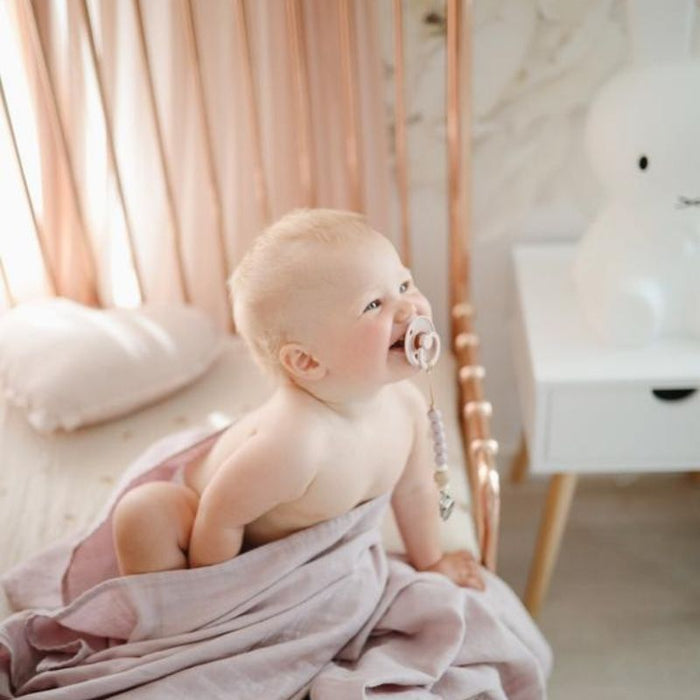 Extra Soft Muslin Crib Sheet by Mushie at $33.99! Shop now at Nestled by Snuggle Bugz for Nursery & Décor.
