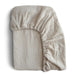 Mini Muslin Crib Sheet by Mushie at $23.99! Shop now at Nestled by Snuggle Bugz for Nursery & Décor.