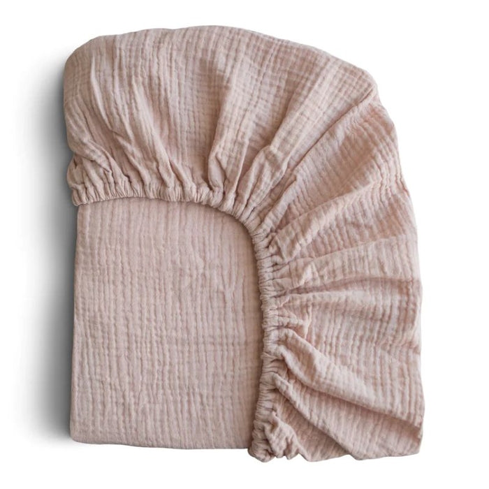 Mini Muslin Crib Sheet by Mushie at $23.99! Shop now at Nestled by Snuggle Bugz for Nursery & Décor.